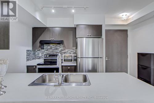 214 - 1346 Danforth Road, Toronto, ON - Indoor Photo Showing Kitchen With Stainless Steel Kitchen With Double Sink With Upgraded Kitchen