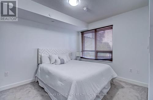 214 - 1346 Danforth Road, Toronto, ON - Indoor Photo Showing Bedroom