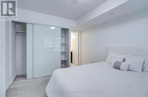 214 - 1346 Danforth Road, Toronto, ON - Indoor Photo Showing Bedroom