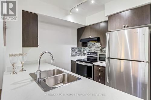 214 - 1346 Danforth Road, Toronto, ON - Indoor Photo Showing Kitchen With Stainless Steel Kitchen With Double Sink With Upgraded Kitchen