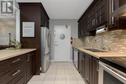 219 - 50 Mississauga Valley Boulevard, Mississauga, ON - Indoor Photo Showing Kitchen With Stainless Steel Kitchen With Double Sink