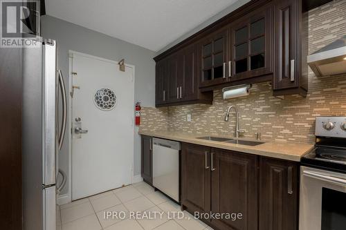 219 - 50 Mississauga Valley Boulevard, Mississauga, ON - Indoor Photo Showing Kitchen With Stainless Steel Kitchen With Double Sink