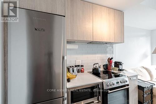 212 - 57 St Joseph Street, Toronto, ON - Indoor Photo Showing Kitchen With Stainless Steel Kitchen