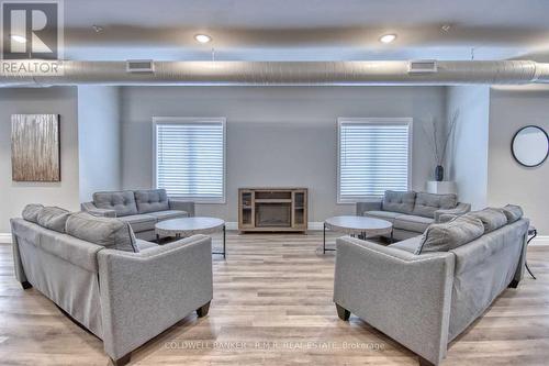 409 - 501 Frontenac Street, Kingston, ON - Indoor Photo Showing Living Room With Fireplace