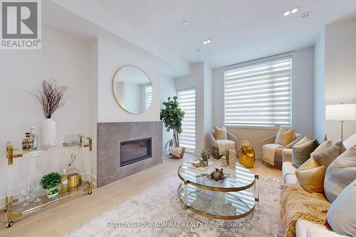 19 Flax Field Lane, Toronto, ON - Indoor Photo Showing Living Room With Fireplace