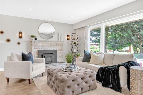 20 Geneva Drive, Hamilton, ON - Indoor Photo Showing Living Room With Fireplace