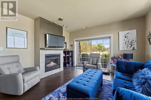 34 Boblo Island Boulevard Unit# 101, Amherstburg, ON - Indoor Photo Showing Living Room With Fireplace