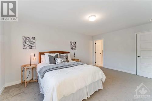 Spacious primary bedroom - 518 Culdaff Road, Stittsville, ON - Indoor Photo Showing Bedroom