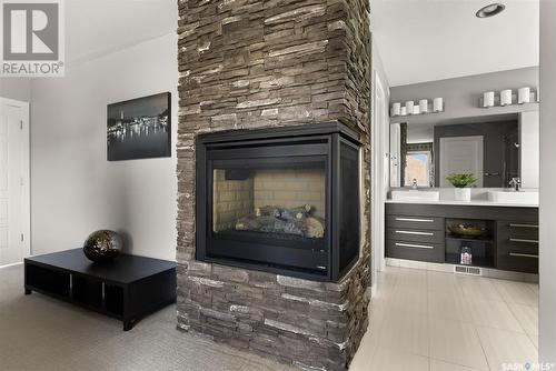 4817 Wright Road, Regina, SK - Indoor Photo Showing Other Room With Fireplace