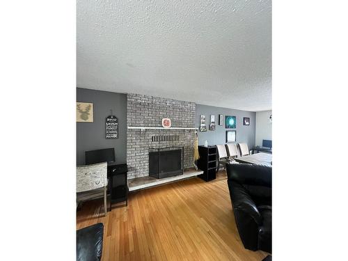 1430 Highland Drive, Castlegar, BC - Indoor Photo Showing Other Room With Fireplace