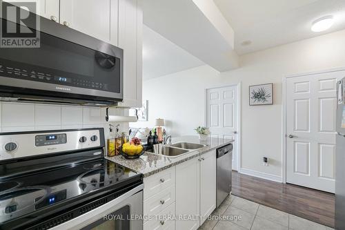 1701 - 339 Rathburn Drive W, Mississauga, ON - Indoor Photo Showing Kitchen With Stainless Steel Kitchen With Double Sink With Upgraded Kitchen