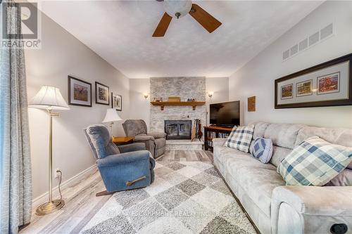 8 Hampton Court, Norfolk (Port Dover), ON - Indoor Photo Showing Living Room With Fireplace