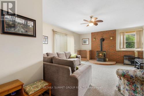 330 Mill Bridge Road, Grey Highlands, ON - Indoor Photo Showing Living Room With Fireplace