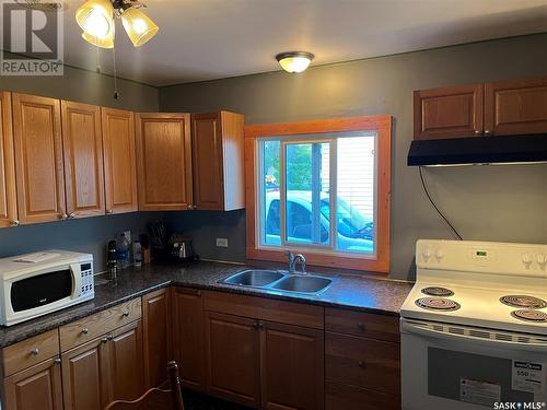 614 St Mary Street, Esterhazy, SK - Indoor Photo Showing Kitchen With Double Sink