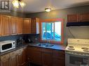 614 St Mary Street, Esterhazy, SK  - Indoor Photo Showing Kitchen With Double Sink 