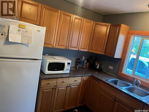 614 St Mary Street, Esterhazy, SK - Indoor Photo Showing Kitchen With Double Sink