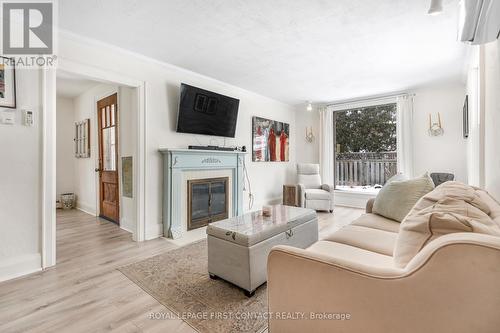 20 Poyntz Street, Barrie, ON - Indoor Photo Showing Living Room With Fireplace