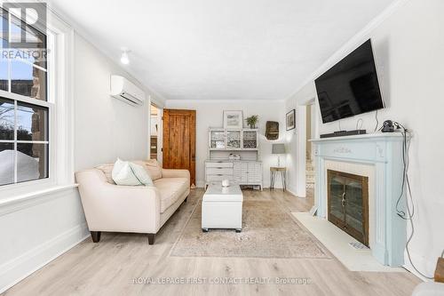 20 Poyntz Street, Barrie, ON - Indoor Photo Showing Living Room With Fireplace