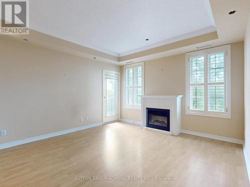 304 - 3351 Cawthra Road, Mississauga, ON - Indoor Photo Showing Living Room With Fireplace