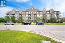 203 - 5705 Long Valley Road, Mississauga, ON  - Outdoor With Balcony With Facade 