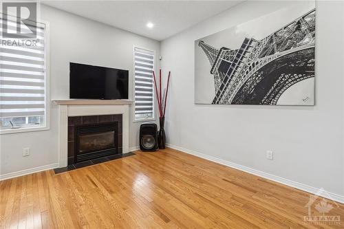 119 Macara Crescent, Ottawa, ON - Indoor Photo Showing Living Room With Fireplace