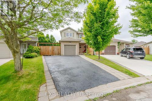 Parking for four cars in the driveway. - 22 Kristen Court, Middlesex Centre (Kilworth), ON - Outdoor With Facade