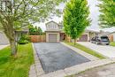 Parking for four cars in the driveway. - 22 Kristen Court, Middlesex Centre (Kilworth), ON  - Outdoor With Facade 