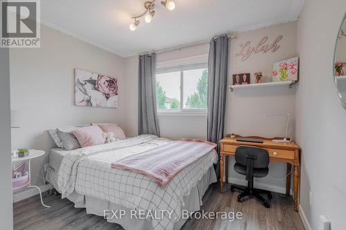 Second bedroom, hard surface floors. - 22 Kristen Court, Middlesex Centre (Kilworth), ON - Indoor Photo Showing Bedroom