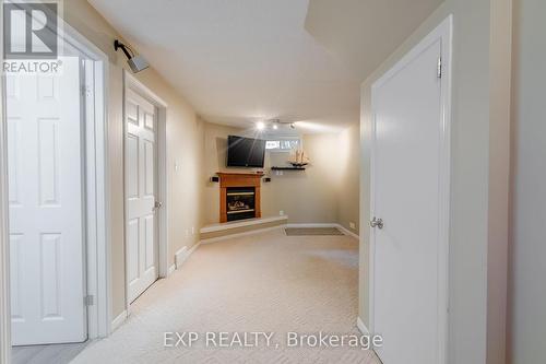 Rec room in the lower level with gas fireplace. - 22 Kristen Court, Middlesex Centre (Kilworth), ON - Indoor Photo Showing Other Room