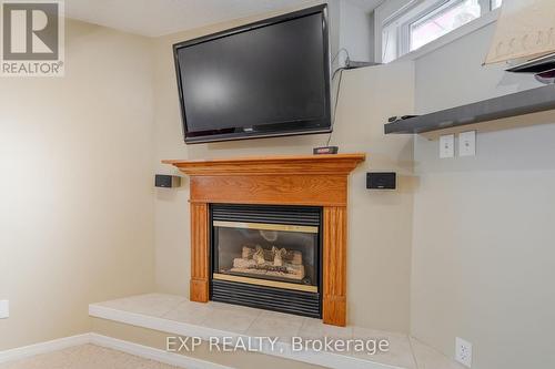 Gas fireplace.... - 22 Kristen Court, Middlesex Centre (Kilworth), ON - Indoor With Fireplace