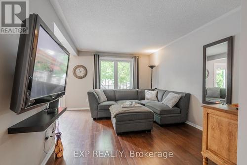 Main floor living room with bamboo floors. - 22 Kristen Court, Middlesex Centre (Kilworth), ON - Indoor Photo Showing Living Room