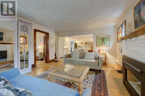 21 Brock Street, Kitchener, ON - Indoor Photo Showing Living Room With Fireplace