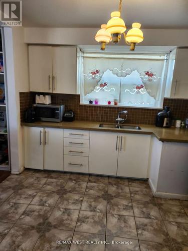 99 Stavely Crescent, Toronto, ON - Indoor Photo Showing Kitchen With Double Sink