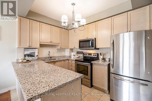 207 - 375 Lakebreeze Drive, Clarington, ON - Indoor Photo Showing Kitchen With Double Sink