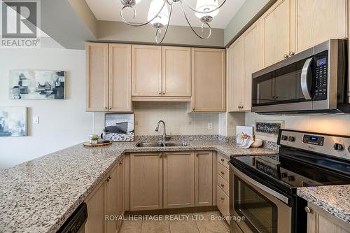 207 - 375 Lakebreeze Drive, Clarington, ON - Indoor Photo Showing Kitchen With Double Sink With Upgraded Kitchen