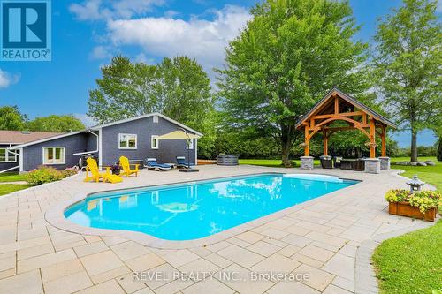65 Eldon Road, Kawartha Lakes, ON - Outdoor With In Ground Pool With Deck Patio Veranda With Backyard