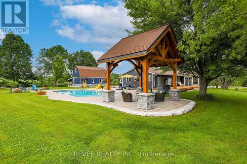 65 Eldon Road, Kawartha Lakes, ON - Outdoor With In Ground Pool With Deck Patio Veranda With Backyard