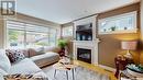 2665 Garnet Street, Regina, SK  - Indoor Photo Showing Living Room With Fireplace 