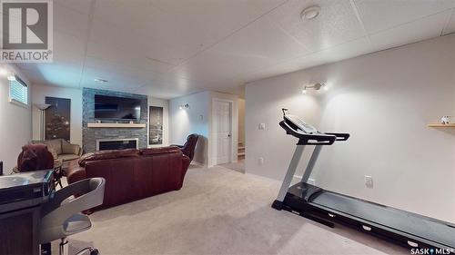 2665 Garnet Street, Regina, SK - Indoor Photo Showing Gym Room With Fireplace