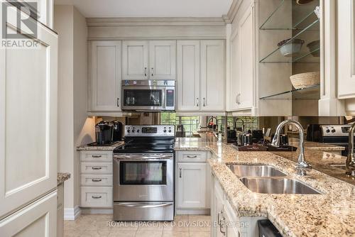 311 - 20 Burkebrook Place, Toronto, ON - Indoor Photo Showing Kitchen With Double Sink