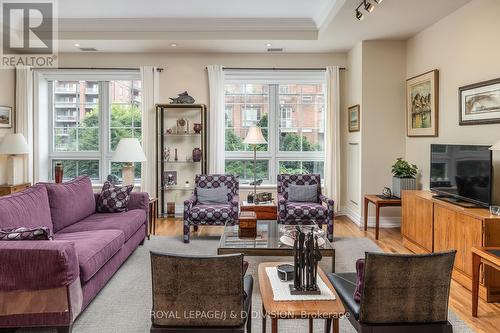 311 - 20 Burkebrook Place, Toronto, ON - Indoor Photo Showing Living Room With Fireplace