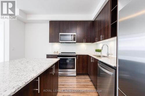 Ph06 - 4655 Glen Erin Drive, Mississauga, ON - Indoor Photo Showing Kitchen With Upgraded Kitchen