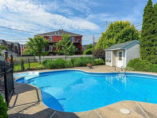 Pool - 11 Rue Daubigny, Candiac, QC - Outdoor With In Ground Pool With Backyard