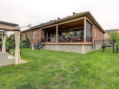 Back facade - 4037 Rue Des Bolets, Saint-Bruno-De-Montarville, QC - Outdoor With Deck Patio Veranda