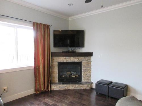 1556 Bann Street, Merritt, BC - Indoor Photo Showing Living Room With Fireplace