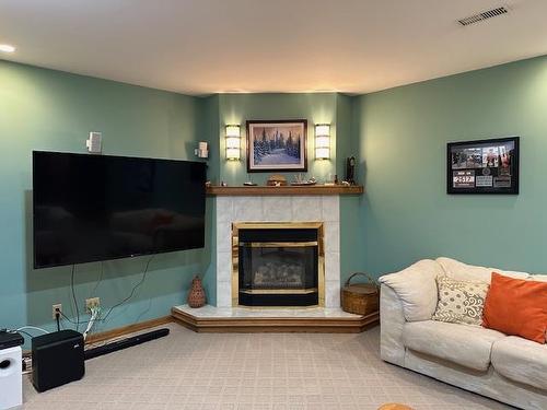 2037 Mount Forest Boulevard, Thunder Bay, ON - Indoor Photo Showing Living Room With Fireplace