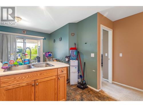 153 Snowsell Street Unit# 1, Kelowna, BC - Indoor Photo Showing Kitchen With Double Sink