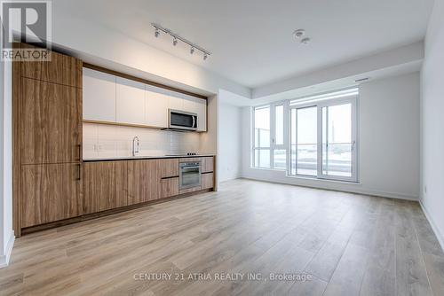 705 - 150 Logan Avenue, Toronto, ON - Indoor Photo Showing Kitchen