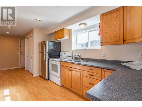 683 San Michelle Road, Kelowna, BC - Indoor Photo Showing Kitchen With Double Sink