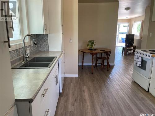 118 2Nd Street E, Lafleche, SK - Indoor Photo Showing Kitchen With Double Sink